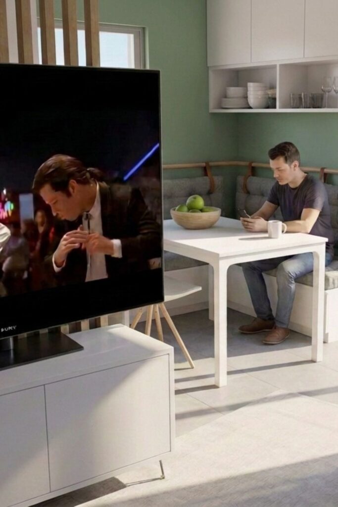 Exemple de clasutra utilisée pour séparer la cuisine de l'espace salon dans une petite pièce de vie avec cuisine ouverte